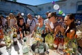 Many women at outdoor bar with glass of wine Royalty Free Stock Photo