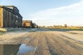 Barracks fenced with barbed wire and watchtowers in Auschwitz-Birkenau concentration camp, Poland Royalty Free Stock Photo