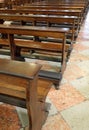 many wooden pews without people