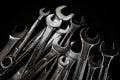 Many wrench metal with black background. Maintenance equipment and repair. Old hand tools