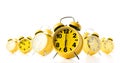 Many yellow alarm clock on white background. Stream of time concept