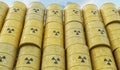 Many yellow barrels with nuclear radioactive waste. 3D rendered illustration Royalty Free Stock Photo