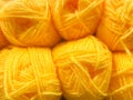 yellow colored wool thread balls, full frame, close up Royalty Free Stock Photo
