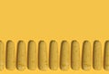 Many yellow corn cobs lie in a row on a yellow background. Creative decorative composition. Modern Art. 3D rendering.