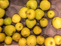 Many yellow delicious apples in a box in the store Royalty Free Stock Photo