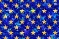 Many yellow stars on blue background