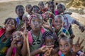 Many young African children with beautifully decorated hair making faces for the camera, Cabinda, Angola, Africa Royalty Free Stock Photo