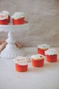 Many yummy cupcakes. Valentine sweet love cupcake on table on light background