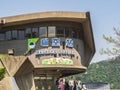 Maokong station, located in the middle of tea plantations, with a group of tourist.