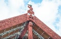 The Maori art carving on the top of Marae a sacred meeting ground in Whakarewarewa, , New Zealand. Royalty Free Stock Photo