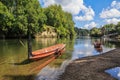 Maori canoes, or waka, on a river in New Zealand