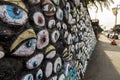 Maori styled eye wall motif on the street.