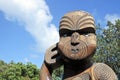 Maori warrior wood carving statue Royalty Free Stock Photo