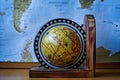 Map of Africa on an ancient globe with world map in the background Royalty Free Stock Photo