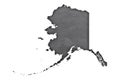 Map of Alaska on dark slate