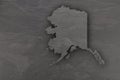 Map of Alaska on dark slate Royalty Free Stock Photo