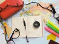 Map of the world in the hands of a man looking at maps Royalty Free Stock Photo