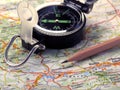 Map, compass and pencil.