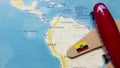 A map of Ecuador and a red plane with a flag of Ecuador attached to its wings. Royalty Free Stock Photo