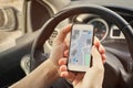 map, driver using direction navigation on GPS map on the screen of mobile smartphone Royalty Free Stock Photo