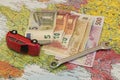 Map of Europe, broken car and euro money Royalty Free Stock Photo