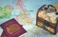 Map of Europe showing the UK, England, Ireland, France, British passports and a chest representing Brexit