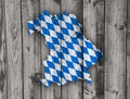 Map and flag of Bavaria on weathered wood