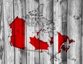 Map and flag of Canada on weathered wood Royalty Free Stock Photo