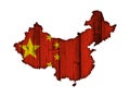 Map and flag of China on weathered wood Royalty Free Stock Photo