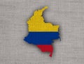 Map and flag of Colombia on old linen Royalty Free Stock Photo