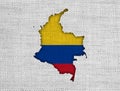 Map and flag of Colombia on old linen Royalty Free Stock Photo