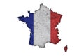 Map and flag of France on weathered concrete Royalty Free Stock Photo