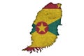 Map and flag of Grenada on weathered concrete Royalty Free Stock Photo
