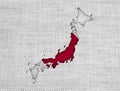 Map and flag of Japan on old linen Royalty Free Stock Photo