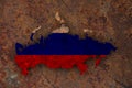 Map and flag of Russia on rusty metal