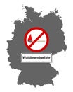 Map of Germany and traffic sign forest fire Royalty Free Stock Photo