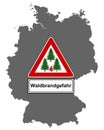 Map of Germany and traffic sign forest fire Royalty Free Stock Photo