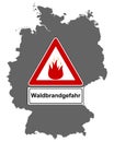 Map of Germany and traffic sign forest fire Royalty Free Stock Photo