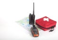 Map, gps navigator, portable radio and first aid kit on a light Royalty Free Stock Photo