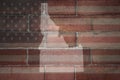 Map of idaho state on a painted flag of united states of america on a brick wall Royalty Free Stock Photo