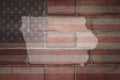 Map of iowa state on a painted flag of united states of america on a brick wall Royalty Free Stock Photo