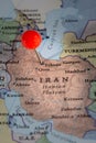 A map of Iran with a pin marking the location of the capital city of Tehran