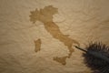 map of italy on a old paper background with old pen Royalty Free Stock Photo