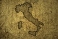 map of italy on a old vintage crack paper background Royalty Free Stock Photo