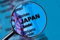 Map of JAPAN through magnifying glass.