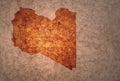 Map of libya on a old vintage crack paper background Royalty Free Stock Photo