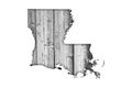 Map of Louisiana on weathered wood