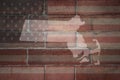 Map of massachusetts state on a painted flag of united states of america on a brick wall Royalty Free Stock Photo