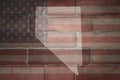 Map of nevada state on a painted flag of united states of america on a brick wall Royalty Free Stock Photo