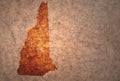 Map of new hampshire state on a old vintage crack paper background Royalty Free Stock Photo